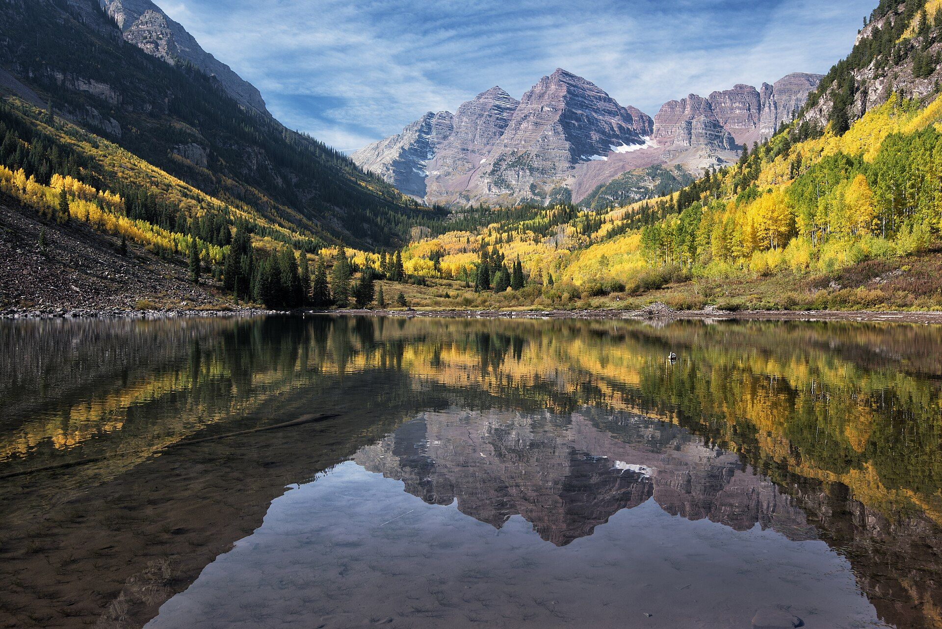 Maroon Bells in autumn, reflected in Maroon Lake near Aspen, Colorado